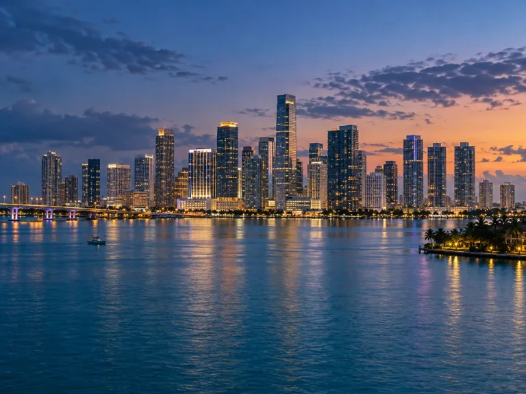 Miami skyline reflected in Biscayne Bay at dusk