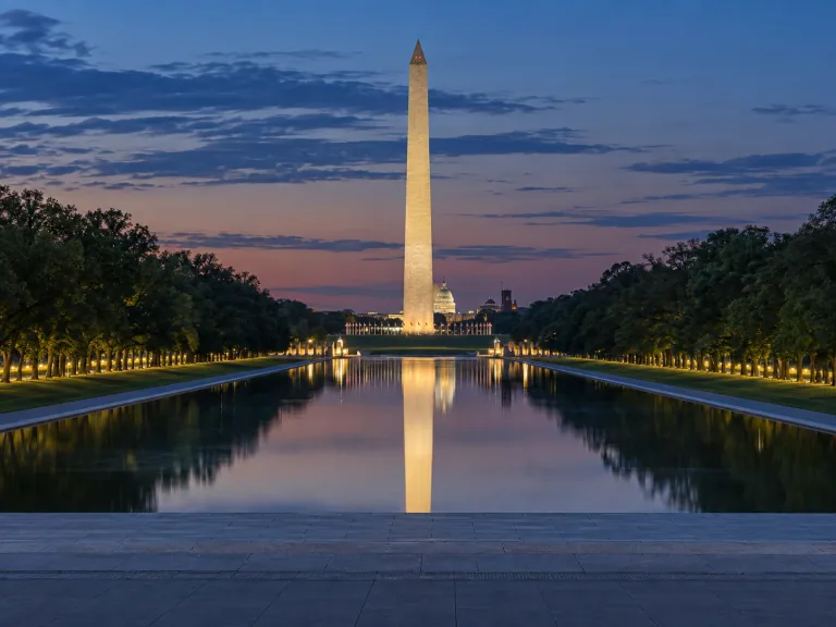 Washington Monument reflected in the Reflecting Pool at dusk